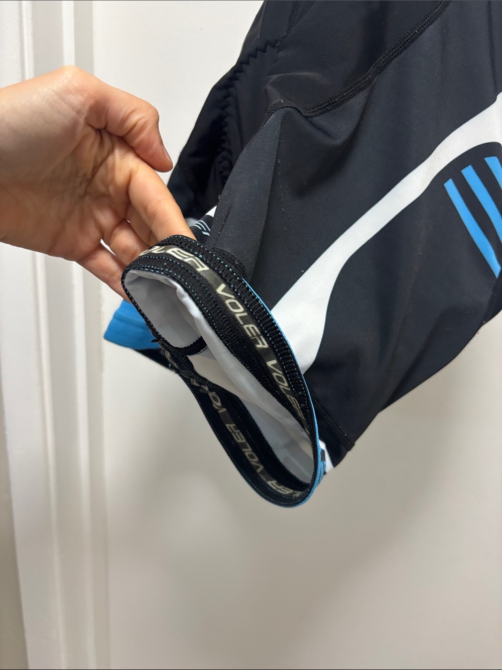 Women’s Black & White Cycling Bib Shorts with Blue Accent from Voler - Picture 4 of 6